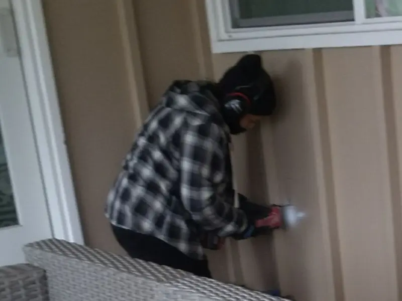 Professional electrician installing an exterior outlet in Vicksburg